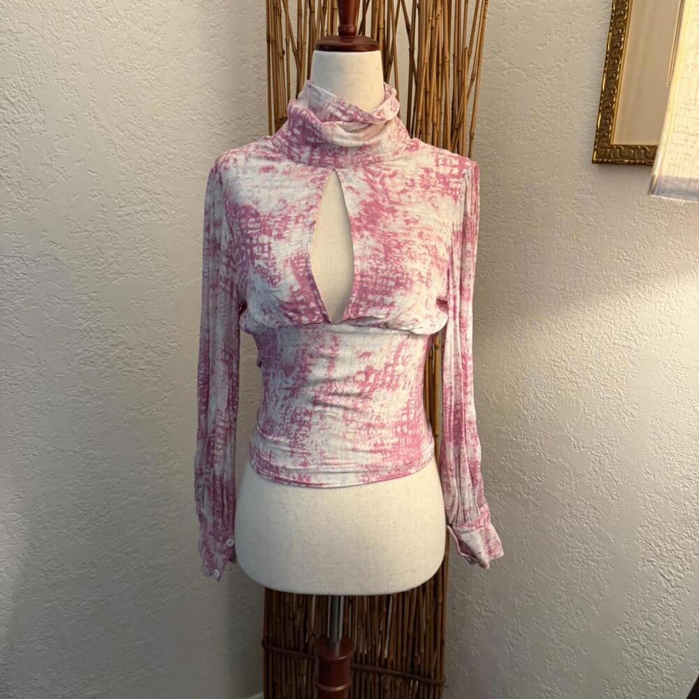 Pink and white high neck floral long sleeve top with a backless tie